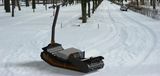 Zmogljive električne motorne sani Snowfox na gosenicah za prevoz po snegu